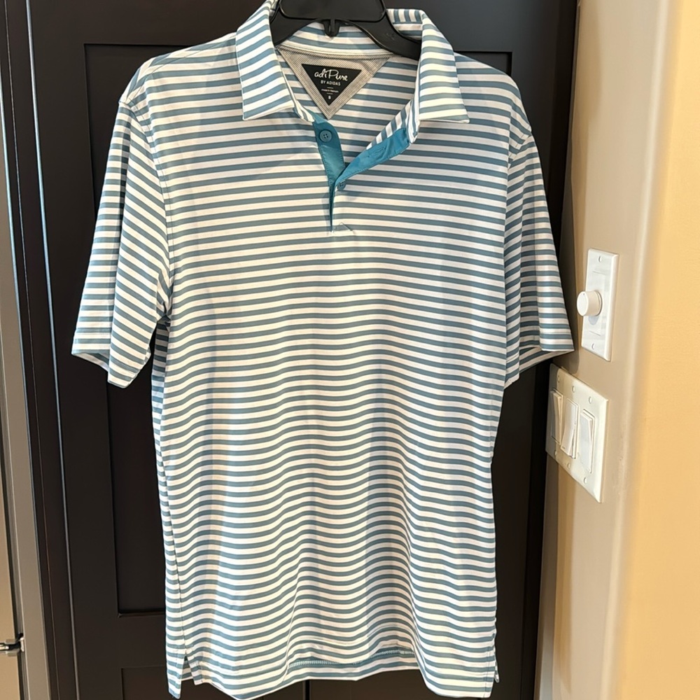 New without tags.  Men’s size small golf shirt.